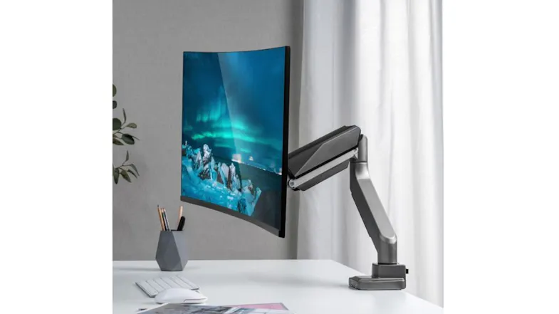 A left angle of a monitor arm with a PC screen A left angle of a monitor arm with a PC screen