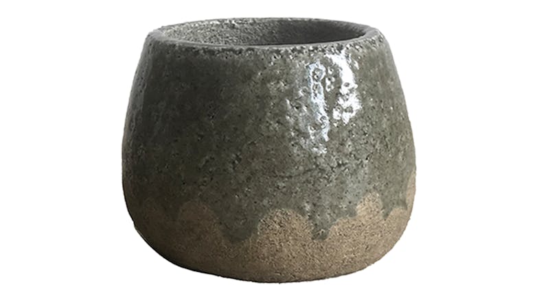 A small-sized glazed stoneware planter with a rounded body A small-sized glazed stoneware planter with a rounded body