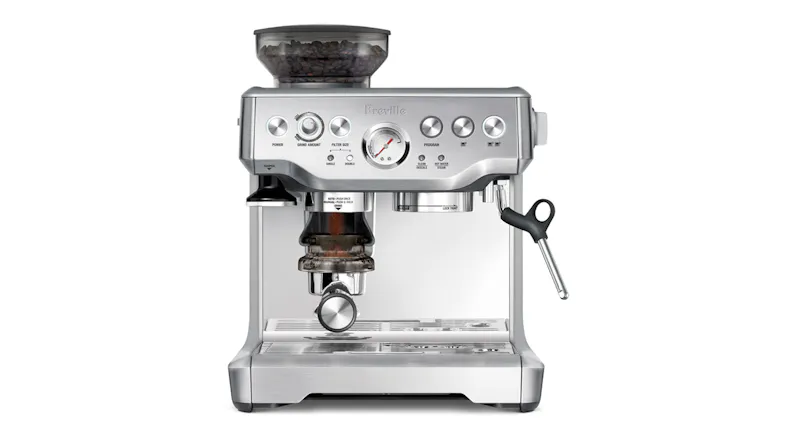 An espresso machine showing its integrated grinder and portafilter cradle An espresso machine showing its integrated grinder and portafilter cradle