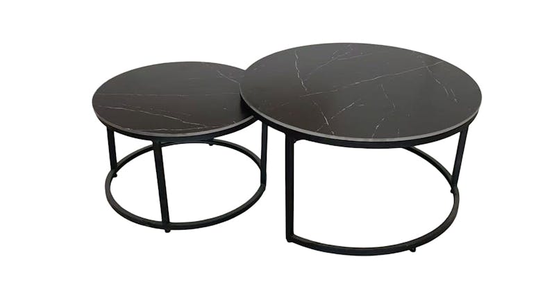 Comet Nest of 2 Tables. Two stylish round black sintered stone nesting tables with black metal frames, one slightly smaller and tucked under. Comet Nest of 2 Tables. Two stylish round black sintered stone nesting tables with black metal frames, one slightly smaller and tucked under.