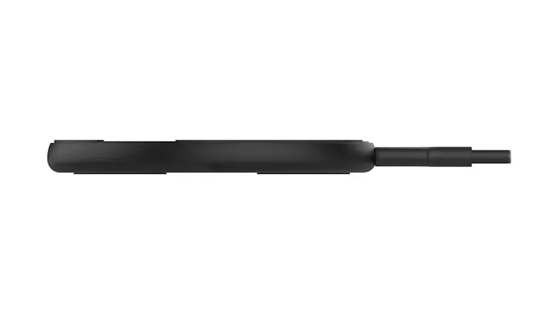 Side view of wireless charger with USB-C cable detached Side view of wireless charger with USB-C cable detached