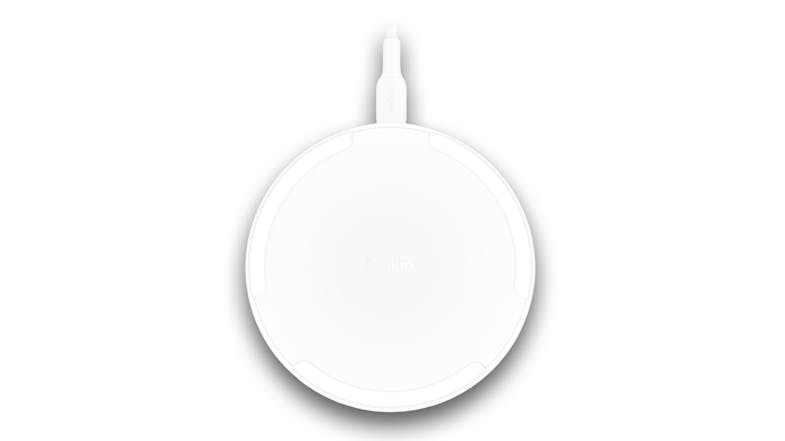A Belkin BoostCharge 15W Wireless Charging Pad with Qi in vibrant white A Belkin BoostCharge 15W Wireless Charging Pad with Qi in vibrant white
