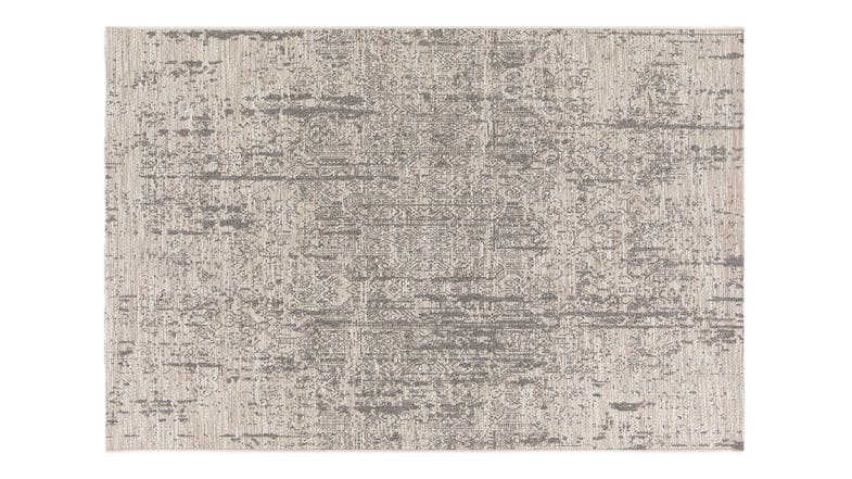 Full view of the Camilo Rug in beige, featuring a subtle texture Full view of the Camilo Rug in beige, featuring a subtle texture