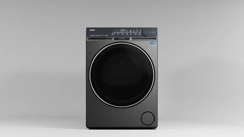 Front view of the Haier Heat Pump dryer with rotary knob and power button Front view of the Haier Heat Pump dryer with rotary knob and power button