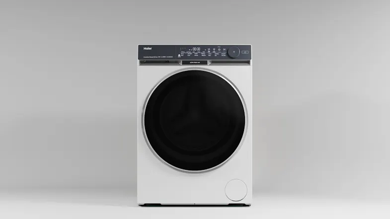 Front view of the washing machine with rotary knob and power button Front view of the washing machine with rotary knob and power button