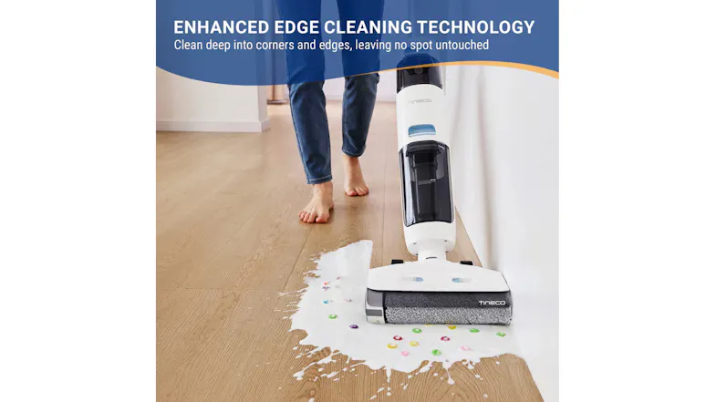 Handstick vacuum demo with enhanced edge cleaning technology text Handstick vacuum demo with enhanced edge cleaning technology text