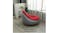 Inflatable chair with red flocked seat and grey non-slip PVC base, shown in a modern living room Inflatable chair with red flocked seat and grey non-slip PVC base, shown in a modern living room