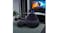 Purple and black inflatable chair with a matching footstool in a modern gaming setup with a large monitor Purple and black inflatable chair with a matching footstool in a modern gaming setup with a large monitor