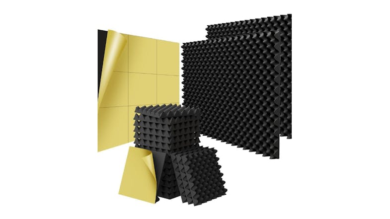 A stacked acoustic foam panels with visible yellow self-adhesive backing A stacked acoustic foam panels with visible yellow self-adhesive backing