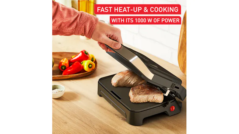 A promotional graphic of a sandwich press showcasing a fast heat-up and cooking A promotional graphic of a sandwich press showcasing a fast heat-up and cooking