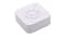 Angled view of a square white noise machine Angled view of a square white noise machine