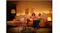 Cozy living room with Philips Hue smart lights and warm ambient glow Cozy living room with Philips Hue smart lights and warm ambient glow