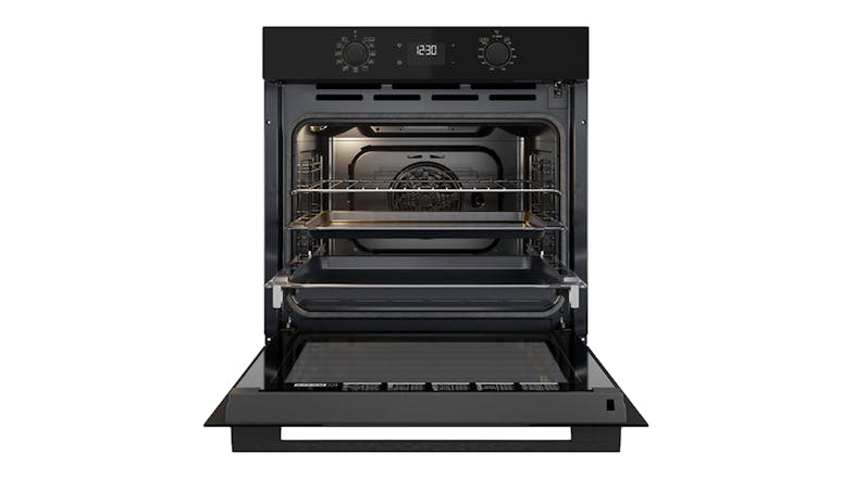 Front view of an open oven with a fan and racks inside Front view of an open oven with a fan and racks inside