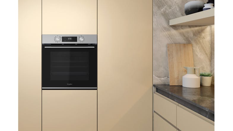 Front view of the Whirlpool oven mounted on the wall Front view of the Whirlpool oven mounted on the wall