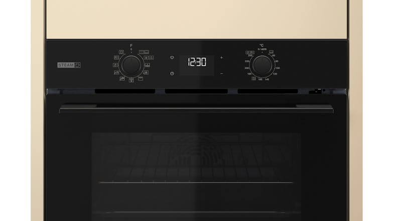 Close-up view of the Whirlpool oven with a black panel and a glass window Close-up view of the Whirlpool oven with a black panel and a glass window