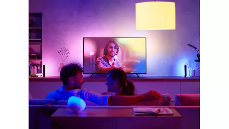 Cozy living room with Philips Hue Gradient Lightstrip and smart ambient lighting Cozy living room with Philips Hue Gradient Lightstrip and smart ambient lighting