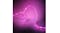 Close-up of the Philips Hue light strip glowing bright pink against a dark background, highlighting vibrant colour Close-up of the Philips Hue light strip glowing bright pink against a dark background, highlighting vibrant colour