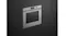 Contemporary black double oven with two compartments. The top section displays 180°C on its digital screen Contemporary black double oven with two compartments. The top section displays 180°C on its digital screen