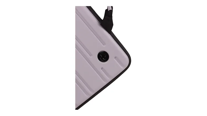 A corner detail of a case showing grooves and a zipper edge A corner detail of a case showing grooves and a zipper edge