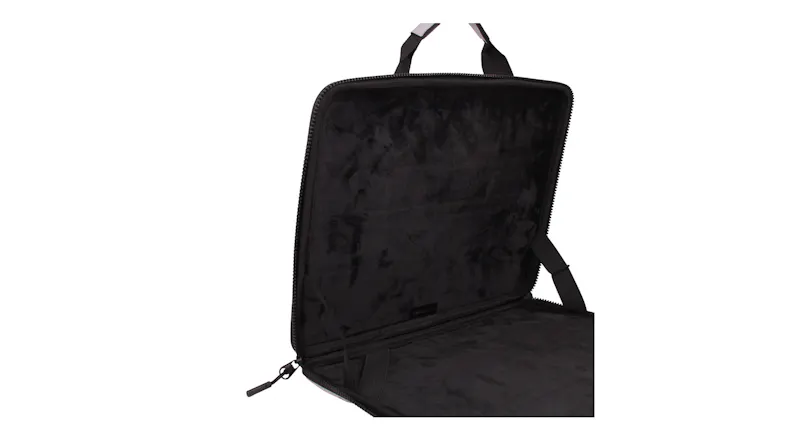 An open black carrying case with plush interior lining and securing straps An open black carrying case with plush interior lining and securing straps