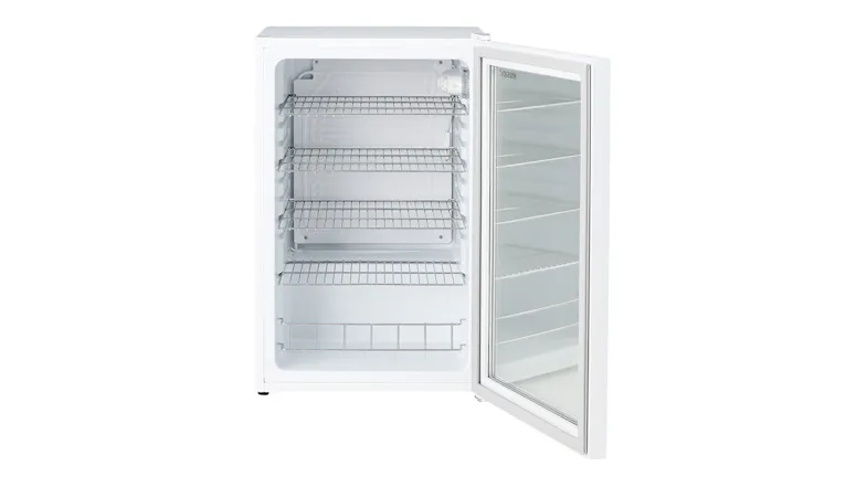 The white bar fridge with its glass door open, displaying four adjustable wire shelves and a lower wire basket The white bar fridge with its glass door open, displaying four adjustable wire shelves and a lower wire basket