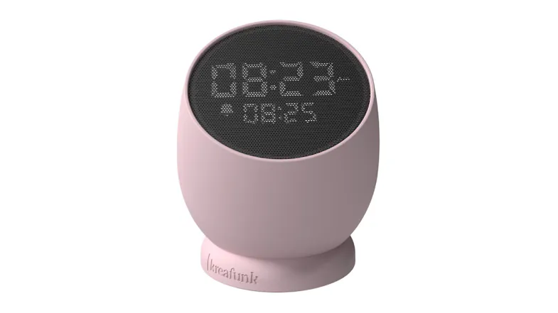 Dusty rose Kreafunk Bell alarm clock with round design and LED time display on black front panel Dusty rose Kreafunk Bell alarm clock with round design and LED time display on black front panel