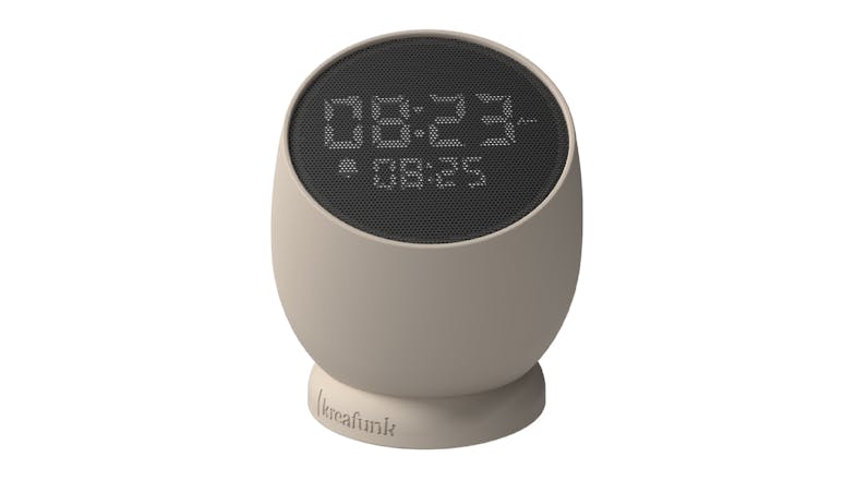 Beige Kreafunk Bell alarm clock with round design and LED time display on black front panel Beige Kreafunk Bell alarm clock with round design and LED time display on black front panel
