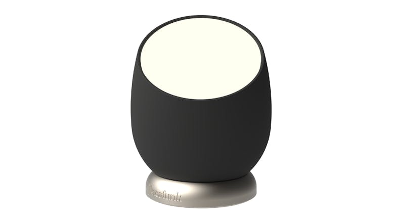 Black Kreafunk Beam wireless dimmable lamp with round design and angled light surface on a rotating base Black Kreafunk Beam wireless dimmable lamp with round design and angled light surface on a rotating base