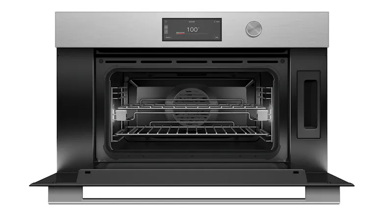An open steam oven with racks and a 100° setting An open steam oven with racks and a 100° setting