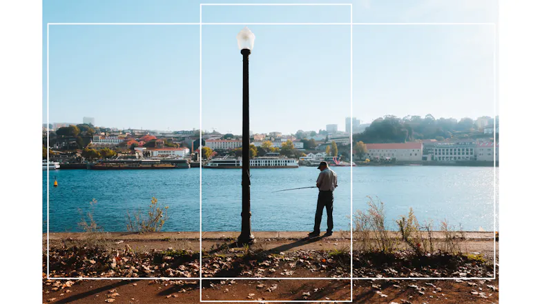 Composition guide lines placed over a landscape photo featuring a river and city background Composition guide lines placed over a landscape photo featuring a river and city background