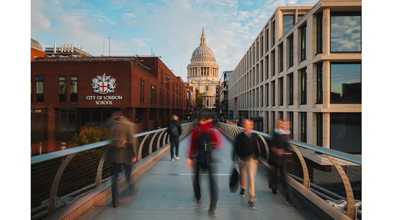 City photography demonstrating motion blur on a pedestrian bridge leading to St. Paul's City photography demonstrating motion blur on a pedestrian bridge leading to St. Paul's
