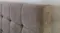 A close-up view of the bed frame's texture A close-up view of the bed frame's texture