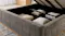 A close-up view of some linens stored in the bed frame's built in storage A close-up view of some linens stored in the bed frame's built in storage