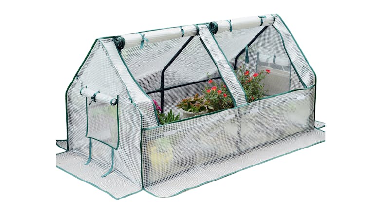 Small mesh greenhouse with roll-up openings, containing potted plants and flowers inside Small mesh greenhouse with roll-up openings, containing potted plants and flowers inside