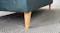 Detail of the Finesse Lounge Suite’s mid-century style wooden leg Detail of the Finesse Lounge Suite’s mid-century style wooden leg