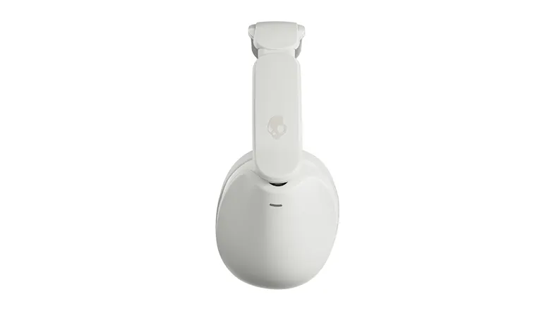 Side view of a headphone with a visible skull logo Side view of a headphone with a visible skull logo