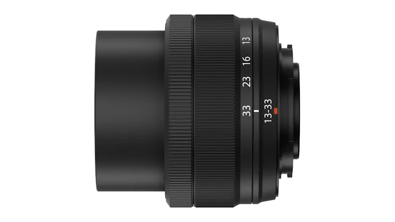 Camera lens extended, showing zoom range markings and textured grip rings Camera lens extended, showing zoom range markings and textured grip rings