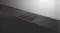 Four-zone induction cooktop on a dark counter Four-zone induction cooktop on a dark counter
