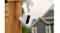 Arlo camera on a wooden fence post outdoors Arlo camera on a wooden fence post outdoors