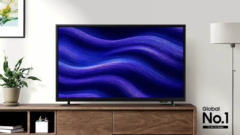 Samsung F6000 Smart LED TV on a wooden stand in a modern living room, displaying a vivid purple abstract pattern Samsung F6000 Smart LED TV on a wooden stand in a modern living room, displaying a vivid purple abstract pattern