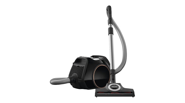 Miele Boost CX1 Cat & Dog PowerLine vacuum in obsidian black with hose, wand, and floorhead attached Miele Boost CX1 Cat & Dog PowerLine vacuum in obsidian black with hose, wand, and floorhead attached