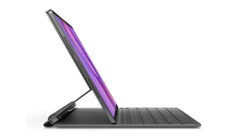Slim side profile of the tablet magnetically attached and propped up by the keyboard folio case Slim side profile of the tablet magnetically attached and propped up by the keyboard folio case