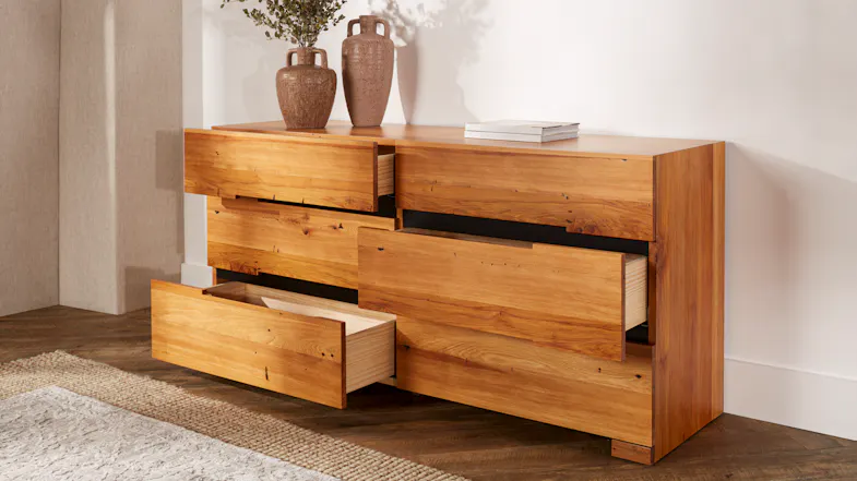 Six-drawer wooden dresser shown with three drawers partially open, featuring the light wood interior Six-drawer wooden dresser shown with three drawers partially open, featuring the light wood interior