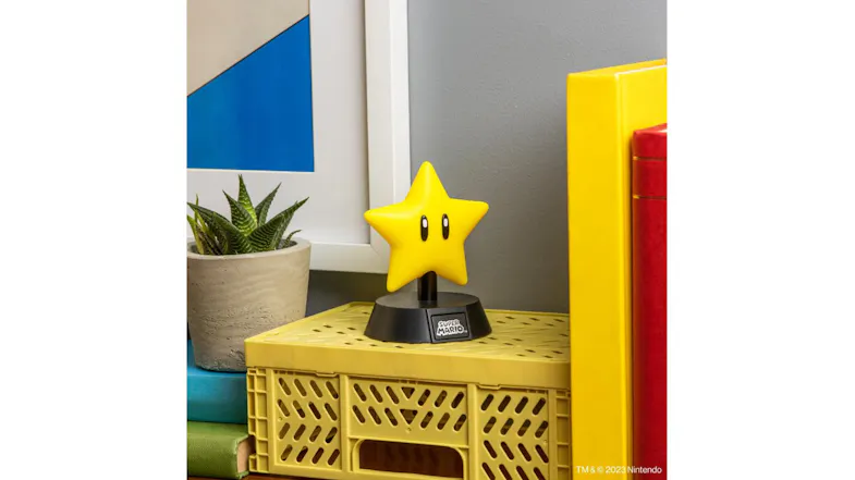 Paladone Icon Light displayed on a beige crate in a modern room setting Paladone Icon Light displayed on a beige crate in a modern room setting
