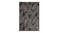 Vertical view of the Botanica Rug , featuring an abstract distressed leaf design Vertical view of the Botanica Rug , featuring an abstract distressed leaf design