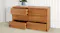 Modern 6-drawer lowboy with three drawers open, featuring smooth curved edges and a clean, minimalist design Modern 6-drawer lowboy with three drawers open, featuring smooth curved edges and a clean, minimalist design