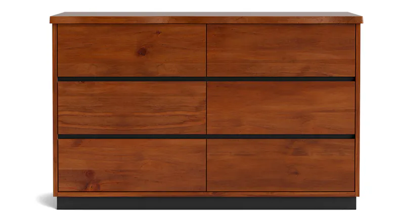 Front view of a low-profile dresser in WS Rimu finish with six drawers and a black base Front view of a low-profile dresser in WS Rimu finish with six drawers and a black base