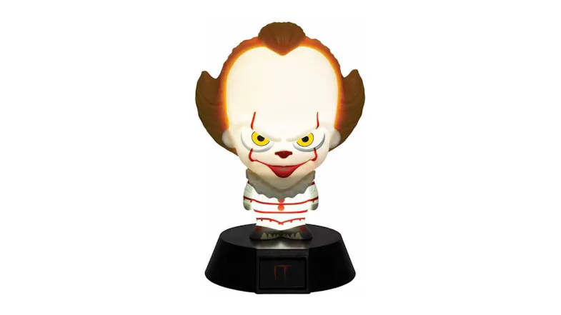 Illuminated Pennywise LED light, showing a glowing white head and orange hair, with facial details Illuminated Pennywise LED light, showing a glowing white head and orange hair, with facial details