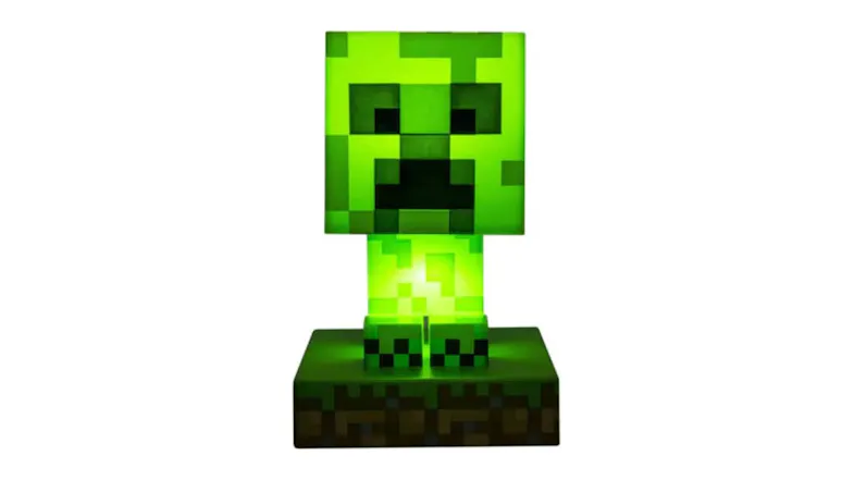 Illuminated Minecraft Creeper LED light in pixelated style, glowing bright green with a blocky head Illuminated Minecraft Creeper LED light in pixelated style, glowing bright green with a blocky head