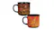Fortnite Heat Changing Mug side by side; the upper one shows the cold, black pattern, while the lower shows the hot, gold design Fortnite Heat Changing Mug side by side; the upper one shows the cold, black pattern, while the lower shows the hot, gold design